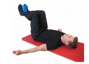 Övningen Pelvic Rolls Wall